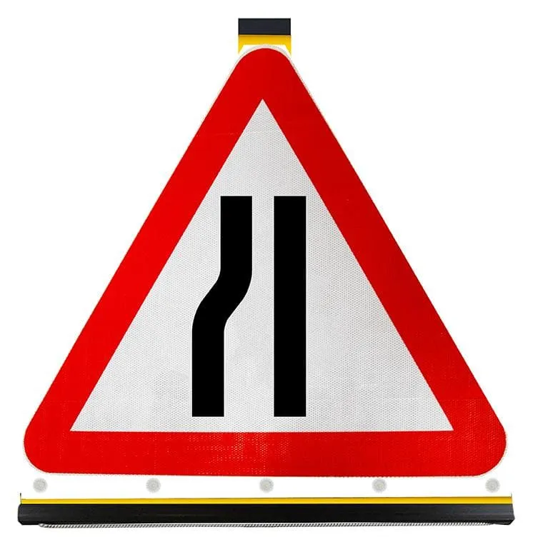 Road Narrows on Left Ahead